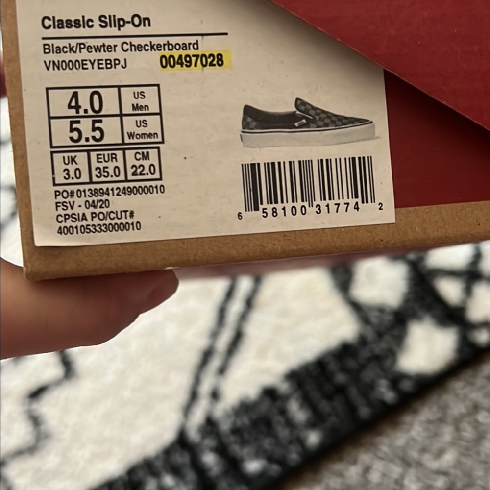 NWT girls vans slip on sneakers.  Never worn.  New in box.  Size 5.